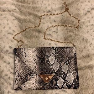 Snake print clutch